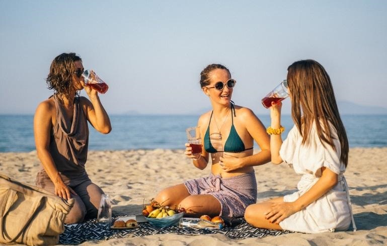 women having a picnic on the beach